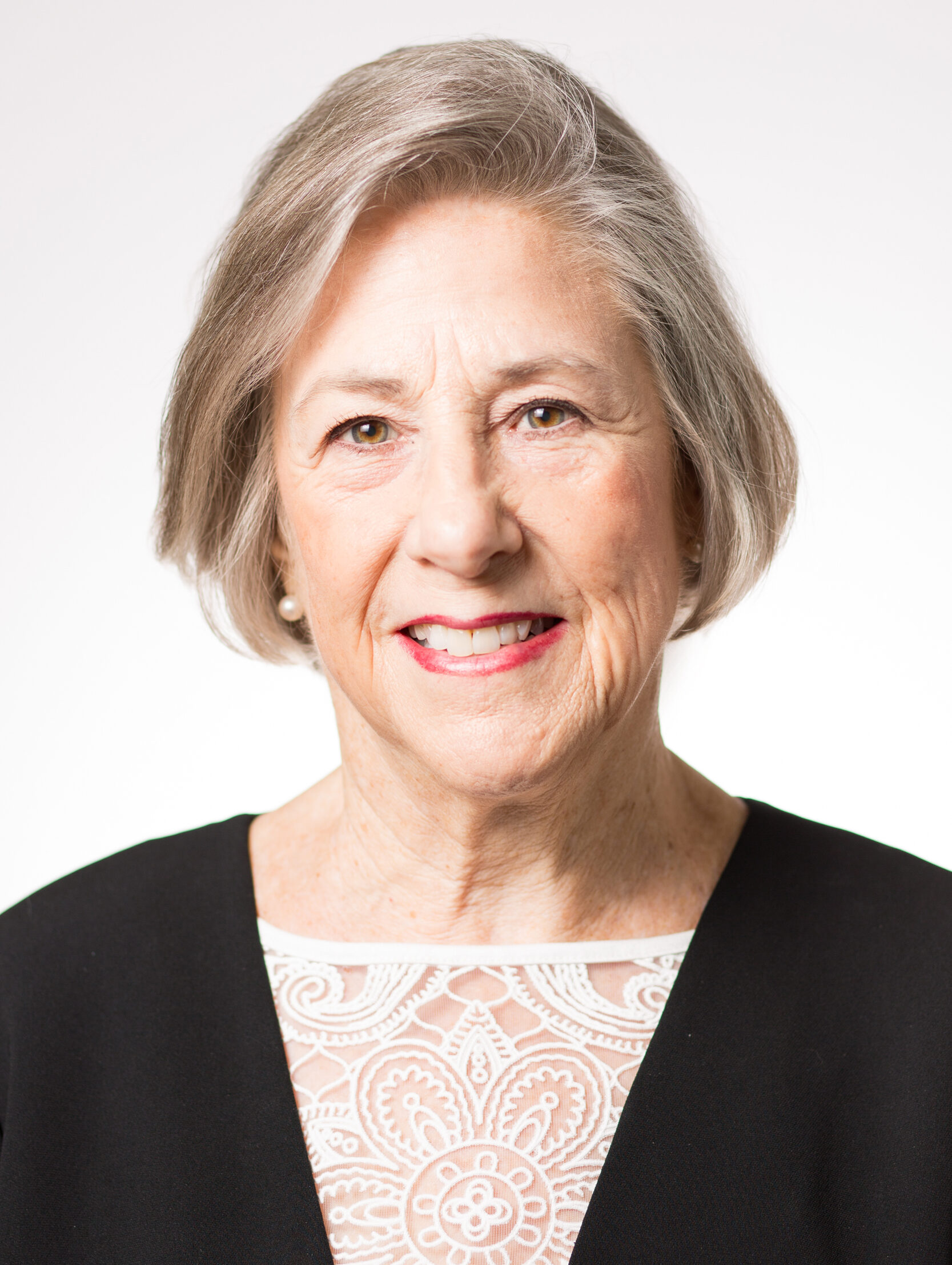 Kathy Pilkington in a black blouse with white lace.