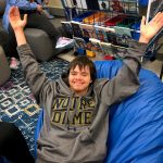 Student in beanbag in sensory space